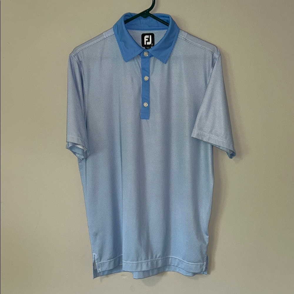 Men’s Footjoy Small golf polo. Excellent condition.